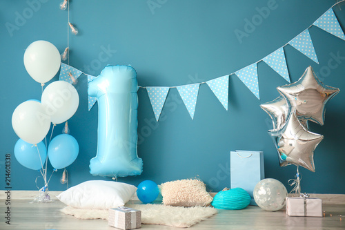 Interior of room decorated for first birthday party photo