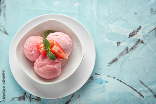 Three scoops of strawberry ...
