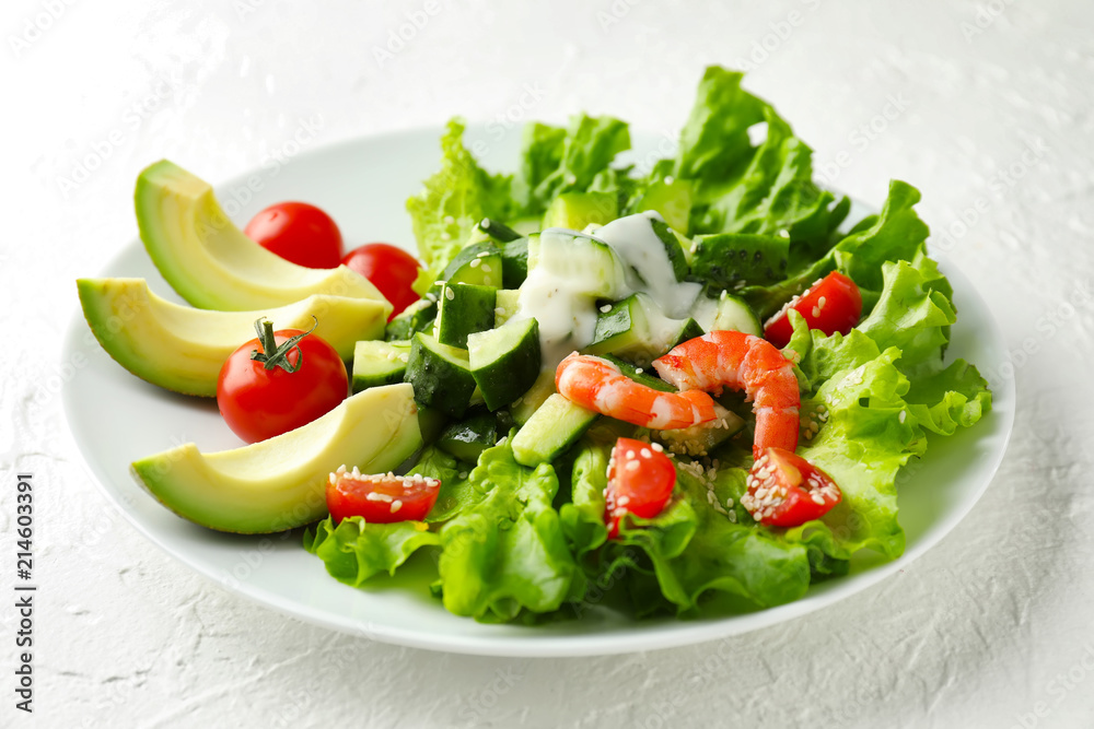 Tasty salad with ripe avocado on plate Tasty salad with ripe avocado on plate