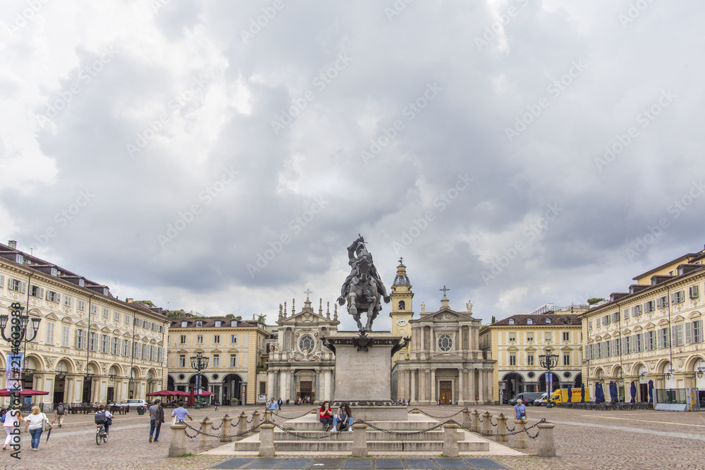 Naklejka premium Turin, Italy -June 12, 2018 :Piazza San Carlo square and twin churches of Santa Cristina and San Carlo Borromeo in the Old Town center of Turin, Italy. Turin, San Carlo square, Italy