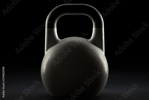 Fototapeta Naklejka Na Ścianę i Meble -  Backlit competition kettlebell silhouette on a fitness studio gym floor with potential copy space on kettlebell