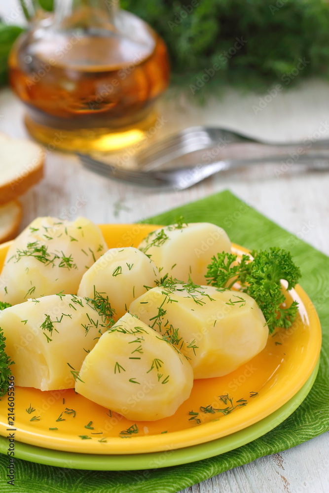 Boiled potatoes with fresh dill and oil