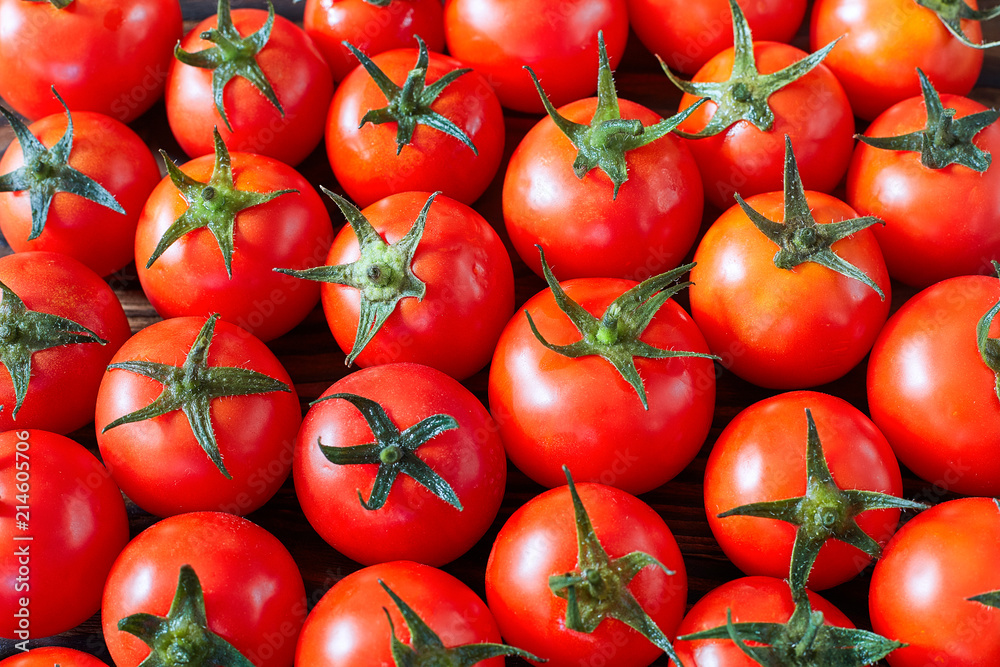 A lot of red tomatoes. Culinary background. A lot of red tomatoes. Culinary background.