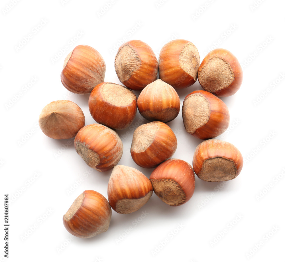 Tasty hazelnuts on white background Tasty hazelnuts on white background