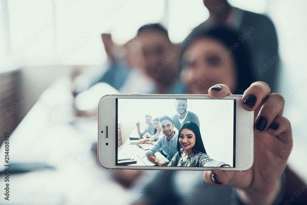 Students Taking Selfie on Smartphone in Classroom.