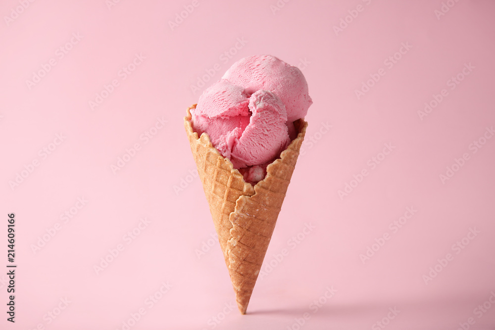 Waffle cone with delicious strawberry ice-cream on color background - obrazy, fototapety, plakaty 