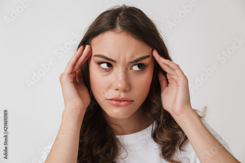Wallpaper Mural Portrait of an annoyed young casual brunette woman Torontodigital.ca