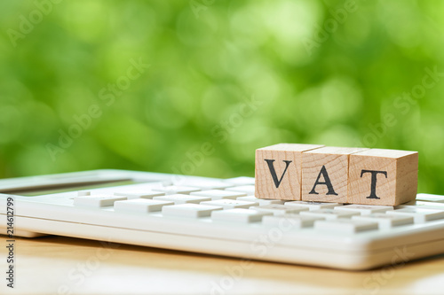 Pay Annual income (VAT) for the year on calculator. using as background business concept and finance concept with copy space  for your text or  design.