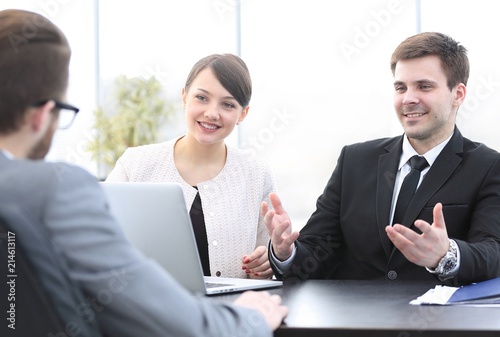 employees communicate with the customer in the office