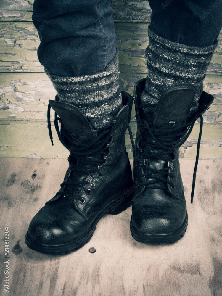 Masculine old shabby rough leather boots for work or traveling. Natural materials. Masculine old shabby rough leather boots for work or traveling. Natural materials.