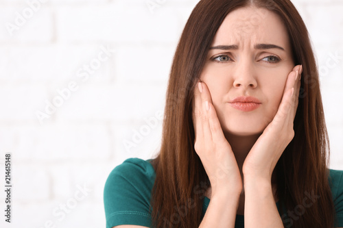 Young woman suffering from ...