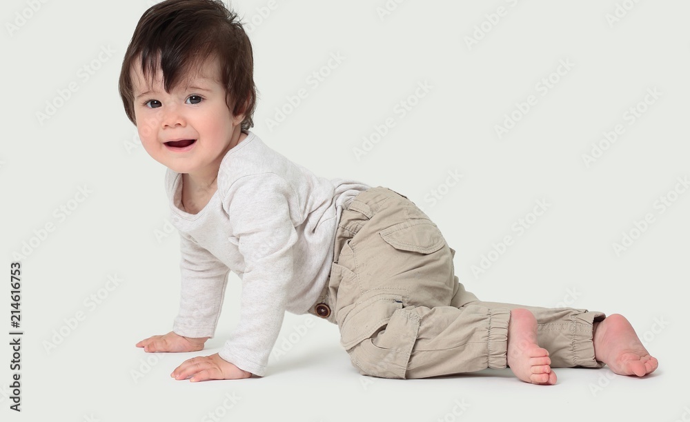 Portrait of a cute sweet baby crawling in the studio Portrait of a cute sweet baby crawling in the studio