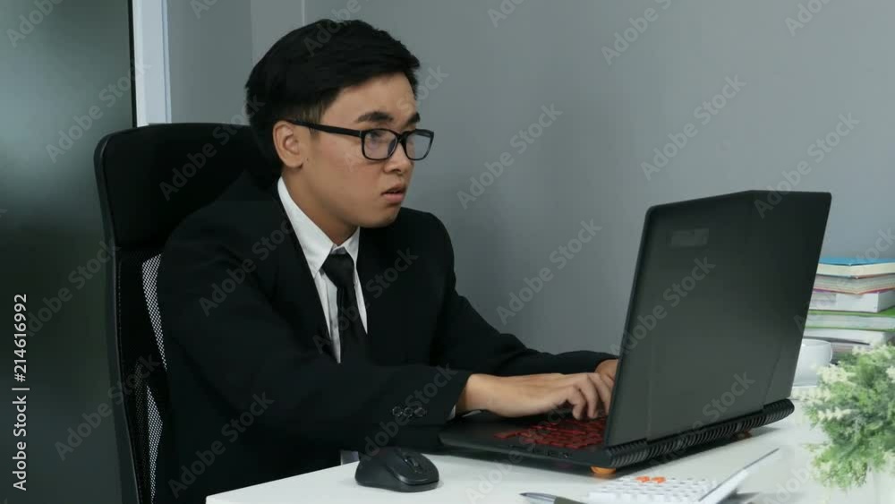 4k of happy successful young business man using laptop computer 4k of happy successful young business man using laptop computer