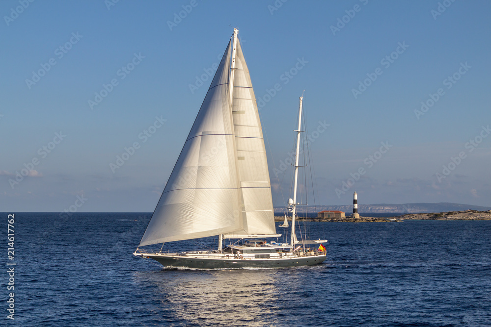 Sailboat sailing in the evening