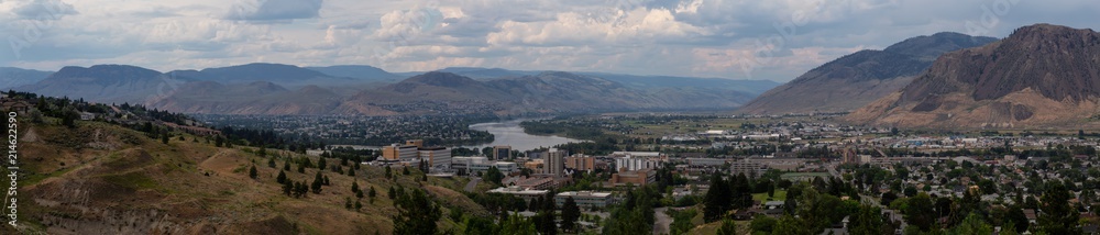 Aerial panoramic view of Kamloops City during a cloudy summer day. Located in Interior BC, Canada.