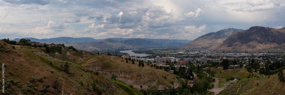 Aerial panoramic view of Kamloops City during a cloudy summer day. Located in Interior BC, Canada.