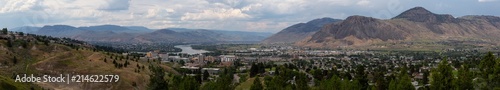 Aerial panoramic view of Kamloops City during a cloudy summer day. Located in Interior BC, Canada.