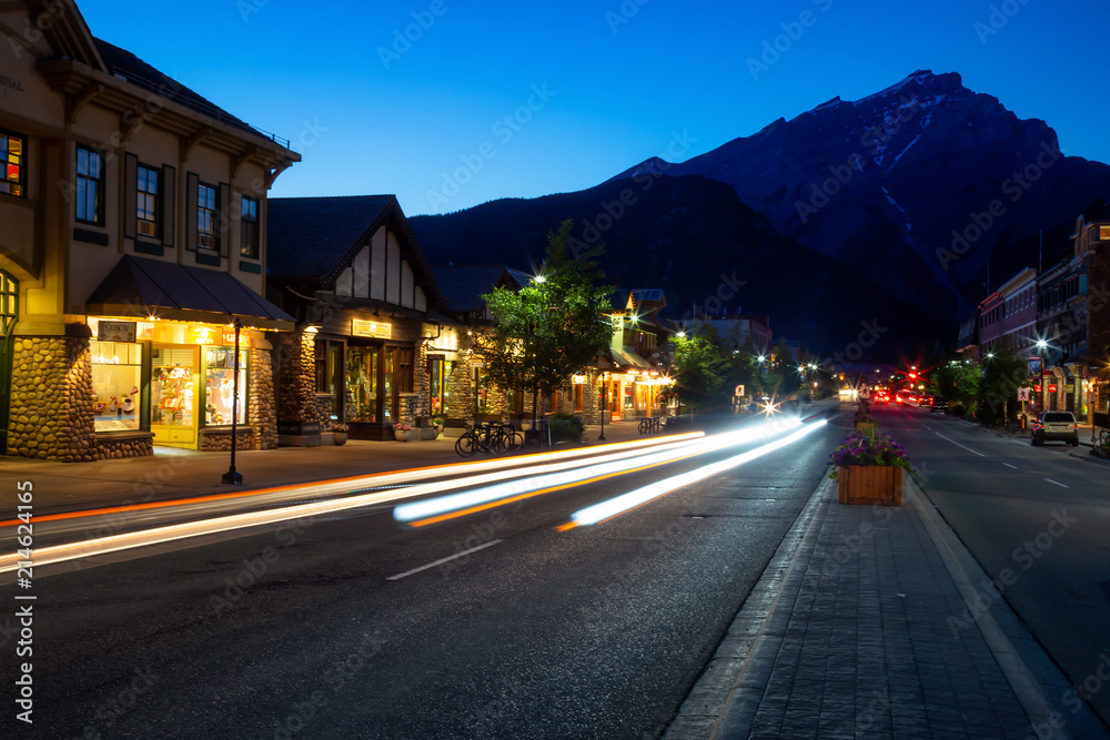 Banff, Alberta, Canada - June 17, 2018: Beautiful view of Banff City during a summer night after sunset. Banff, Alberta, Canada - June 17, 2018: Beautiful view of Banff City during a summer night after sunset.