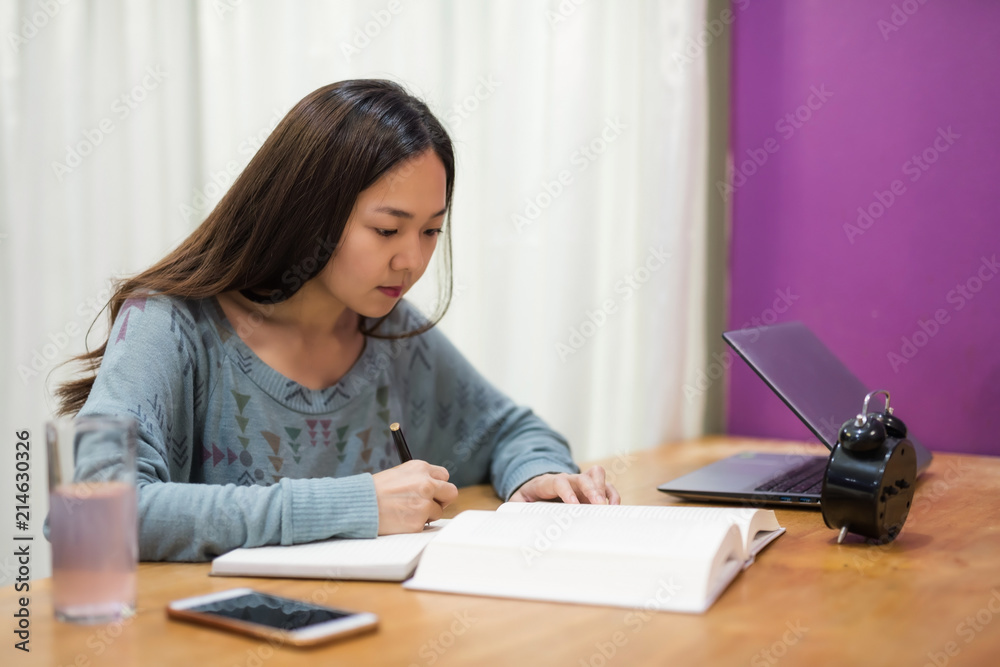 Student woman read book and take note Student woman read book and take note