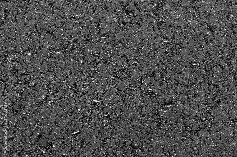 Texture of fresh hot asphalt. Black background resembling anthracite. Texture of fresh hot asphalt. Black background resembling anthracite.