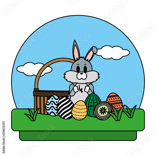 color rabbit standing with hamper and eggs easter