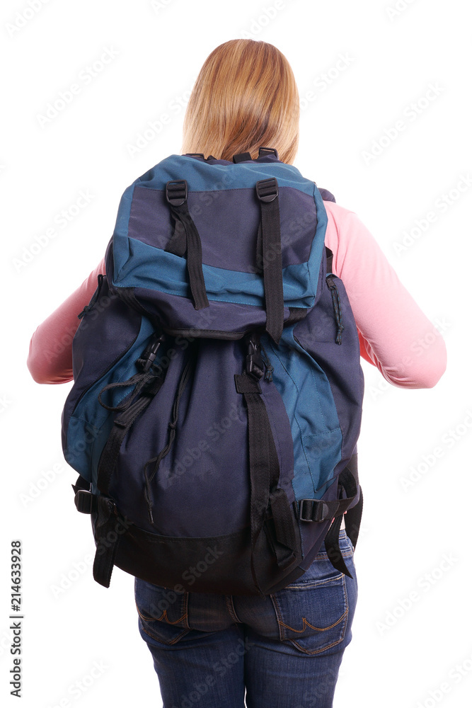 rear view of a female backpacker isolated rear view of a female backpacker isolated