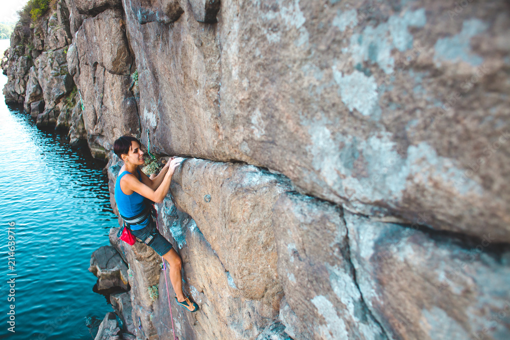 A climber above the water. A climber above the water.