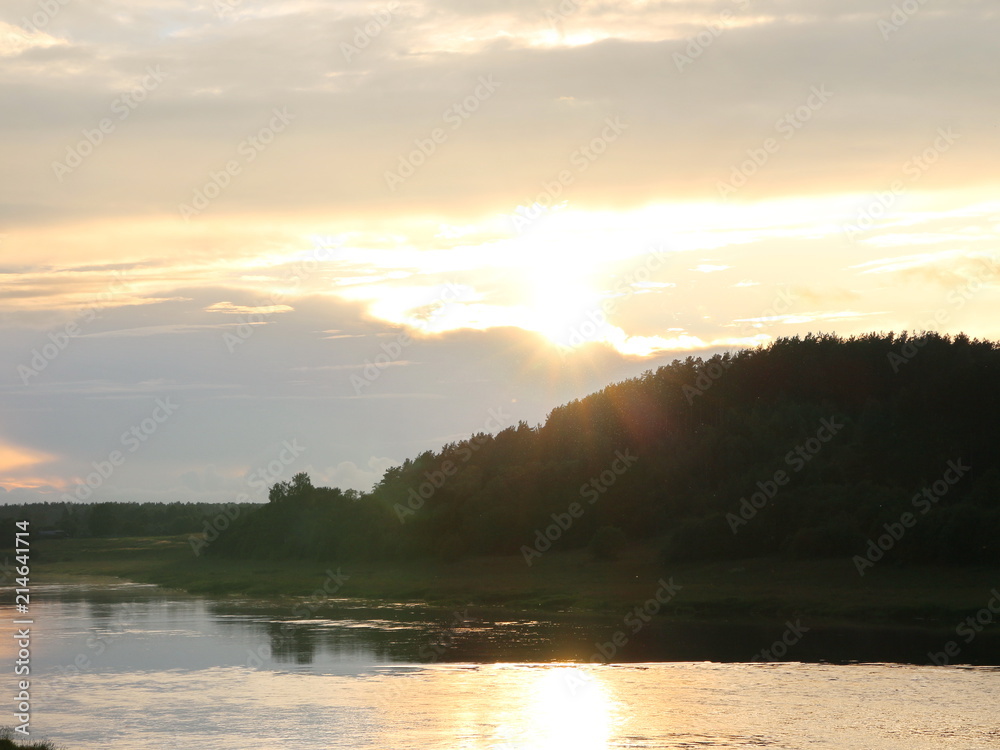 sunset over the river in summer sunset over the river in summer