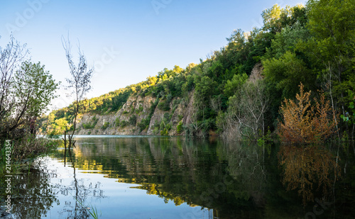 Fototapeta Naklejka Na Ścianę i Meble -  Rocks and a mountain lake in summer