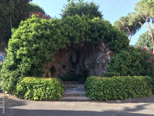 Small outdoor chapel for Holy Mary near catabombs in Rome, Italy