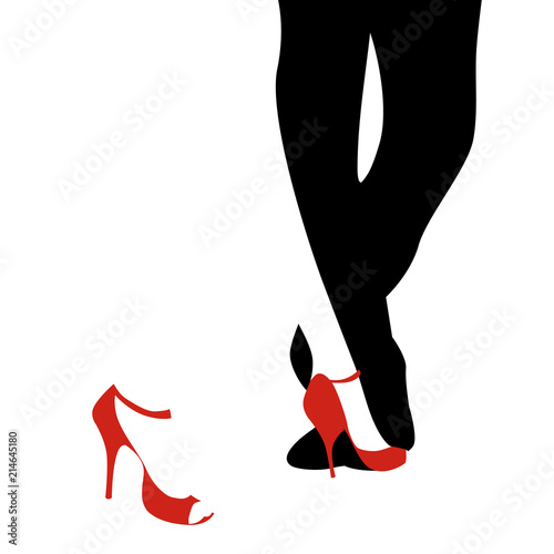 Legs of woman and man dancing tango on white background