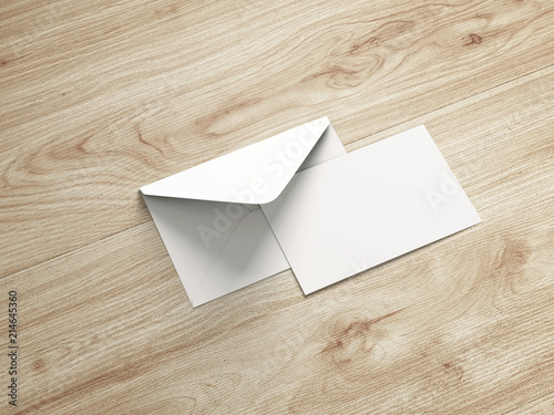 White envelope and post card on a background.