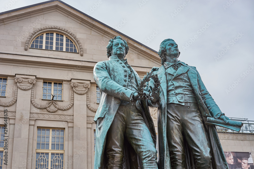 Famous sculpture of Goethe and Schiller in the city of Weimar in Germany / Most famous classical german authors / 18th century Famous sculpture of Goethe and Schiller in the city of Weimar in Germany / Most famous classical german authors / 18th century