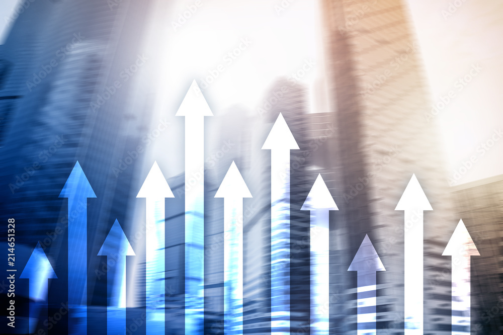 Up arrow graph on skyscraper background. Invesment and financial growth concept.