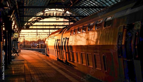 Train in sunset in station