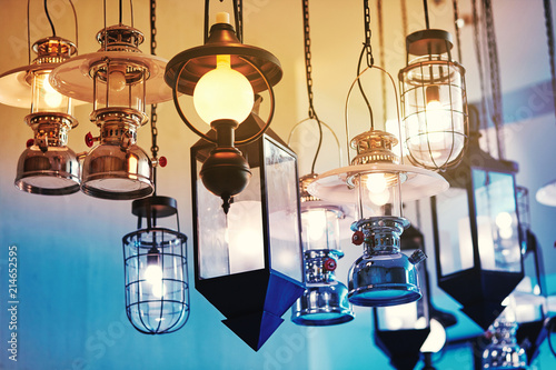 Variety of vintage lamp and lantern decorated in the building lights © manees
