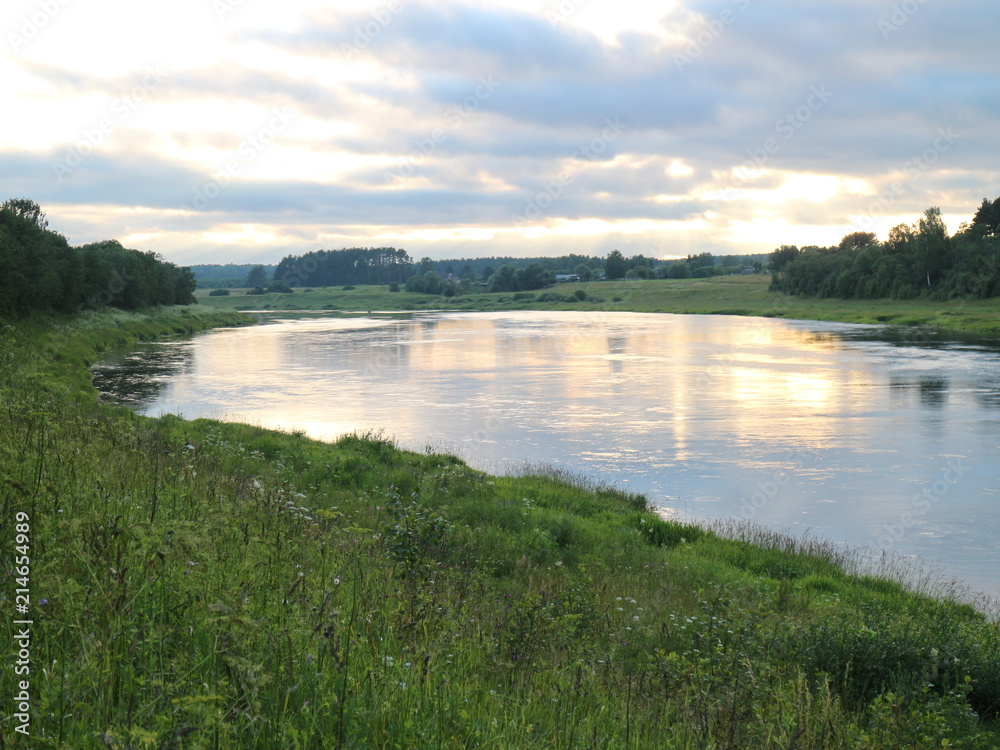 sunset over the river in summer