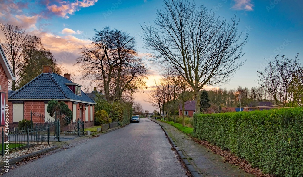 Dutch village in the north of the Netherlands in the sunset Dutch village in the north of the Netherlands in the sunset