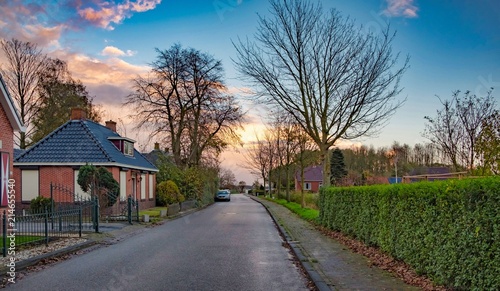 Dutch village in the north of the Netherlands in the sunset
