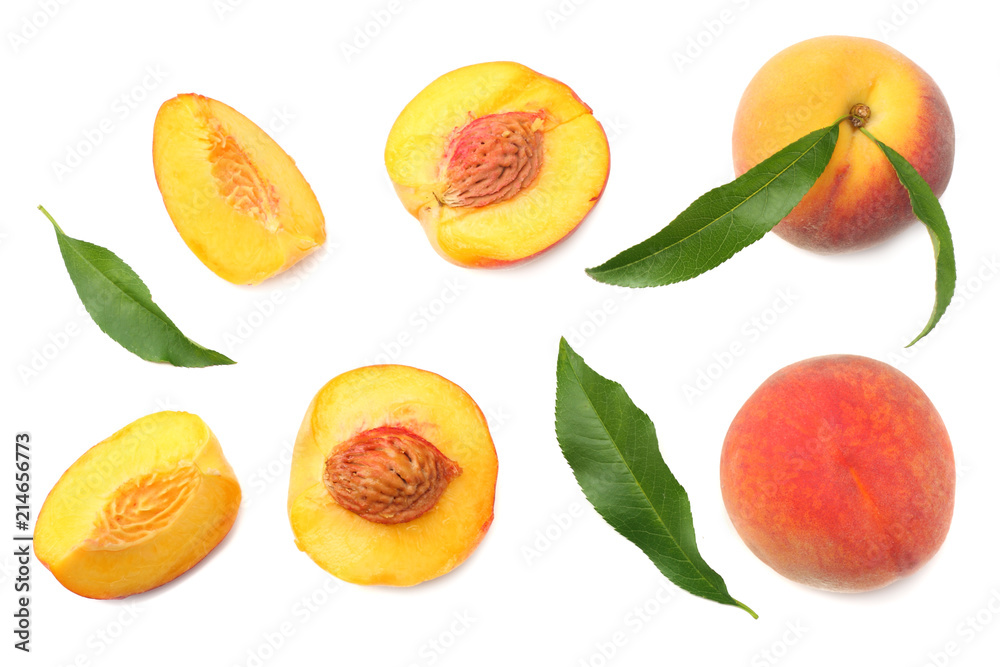 peach fruit with green leaf and slices isolated on white background. top view peach fruit with green leaf and slices isolated on white background. top view