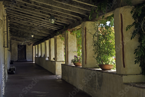 Portico of the Franciscan Carmel Mission Basilica in Monterey, California photo