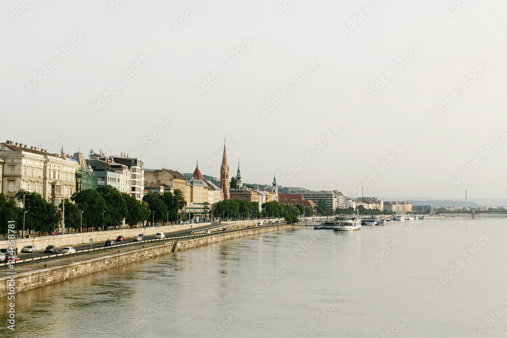 amazing  view of old coast at river and sidewalk in the morning light in Budapest city, travel concept, space for text