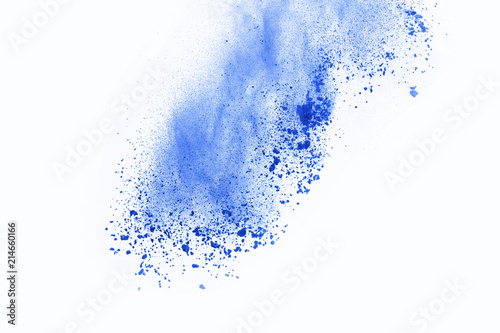 Abstract of blue powder explosion on white background. Blue powder splatted isolate. Colored cloud. Colored dust explode. Paint Holi.