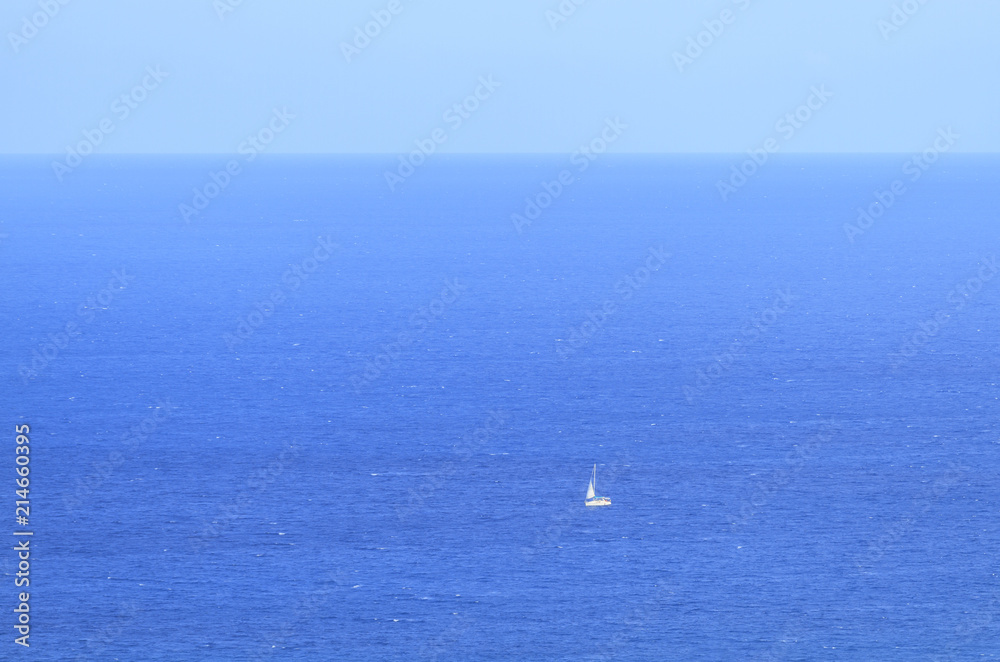 Lonely yacht against the blue sea in Antalya