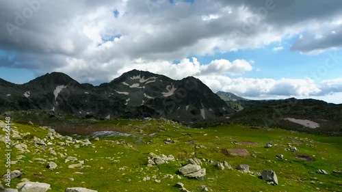 Timelapse from Kamenitsa peak, Pirin Mountain in Bulgaria at Summer. photo