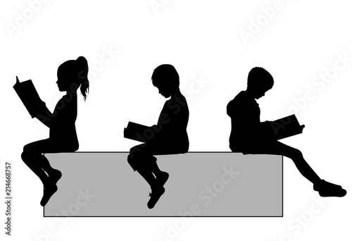 The child is reading a book.