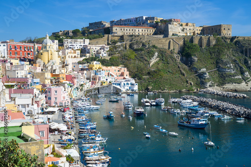 Beautiful view of traditional fishing boats moored in Corricella harbour on the island of Procida  Italy.