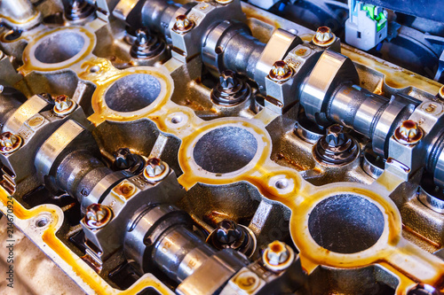 Camshafts and valve in oil on the car engine, Service and repair of car. photo