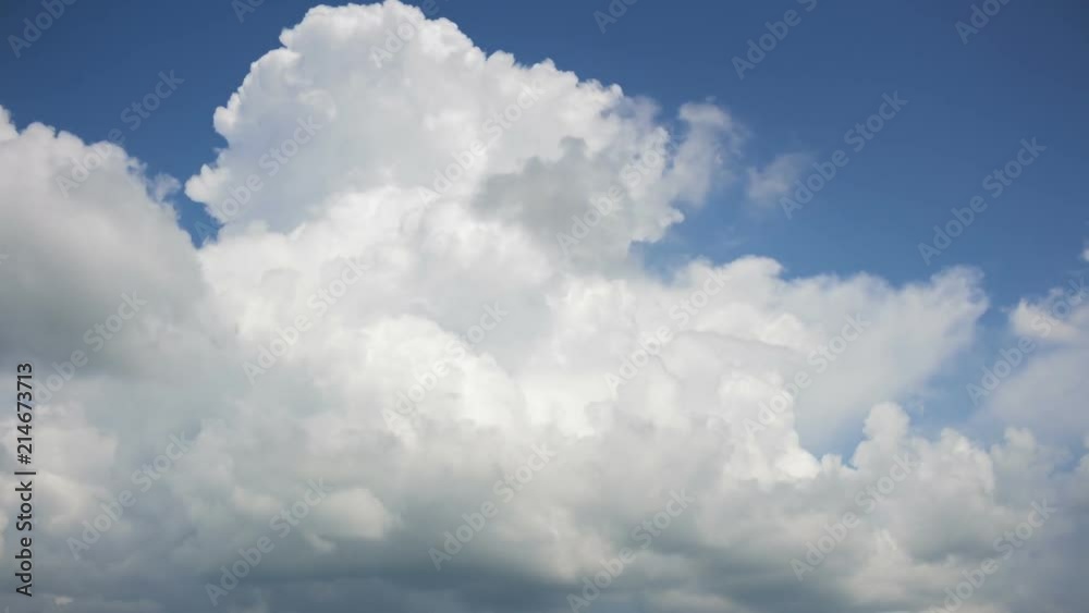 Cumulonimbus cloud on blue sky background, time-lapse Cumulonimbus cloud on blue sky background, time-lapse