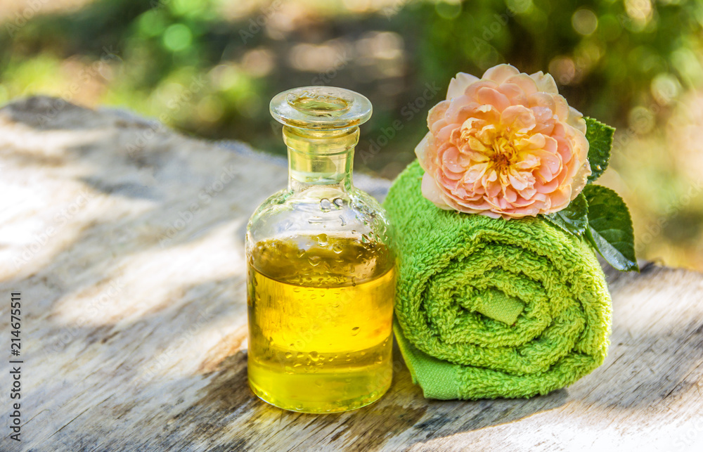 Natural cosmetics for hair. Essential oil and a soft towel. Spa and aromatherapy. Natural cosmetics for hair. Essential oil and a soft towel. Spa and aromatherapy.